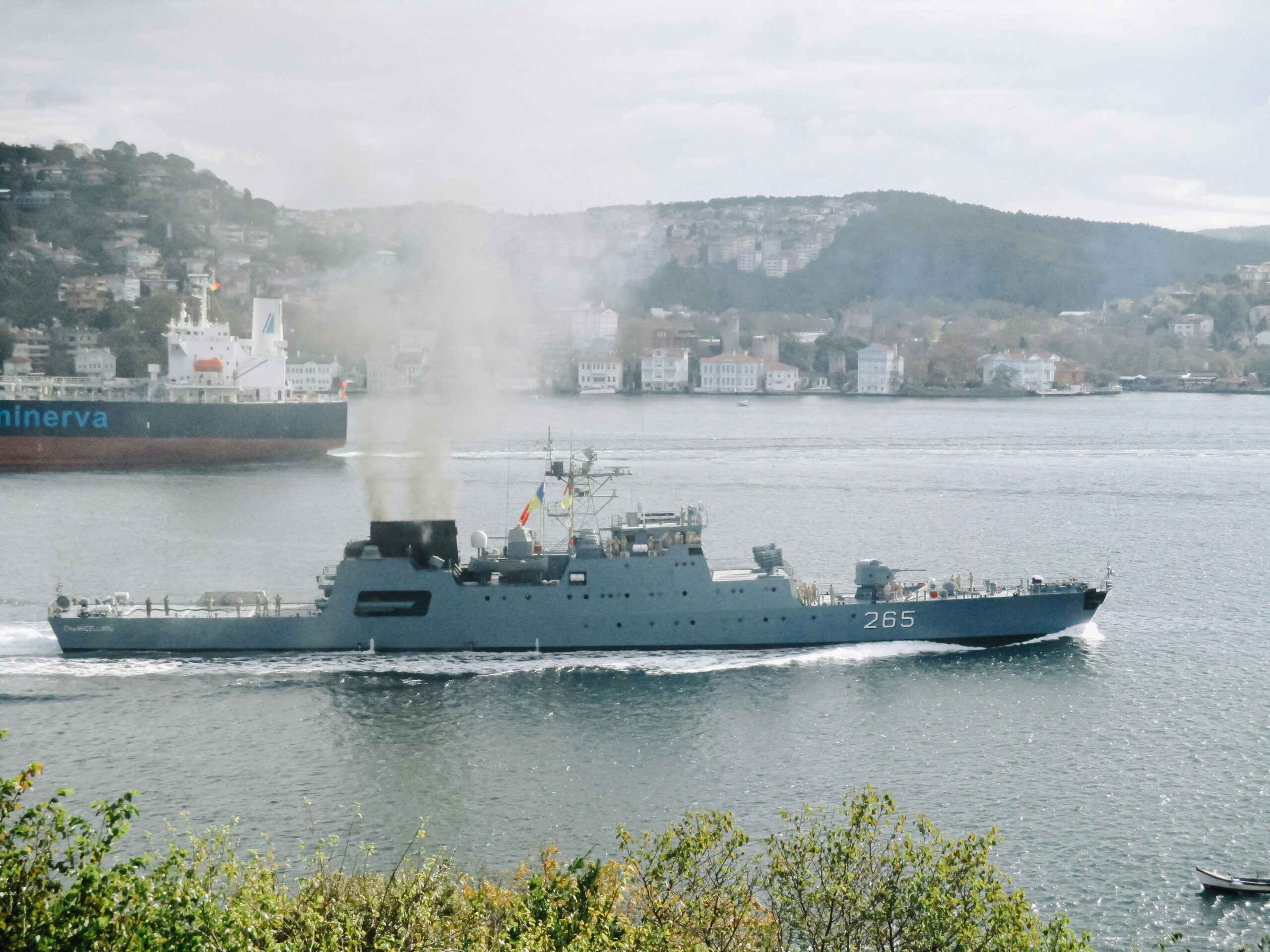 Navy warship cruising through the Bosphorus in Istanbul, Turkey, near Sarıyer.